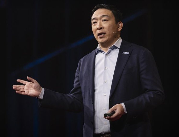 Andrew Yang on a stage speaking